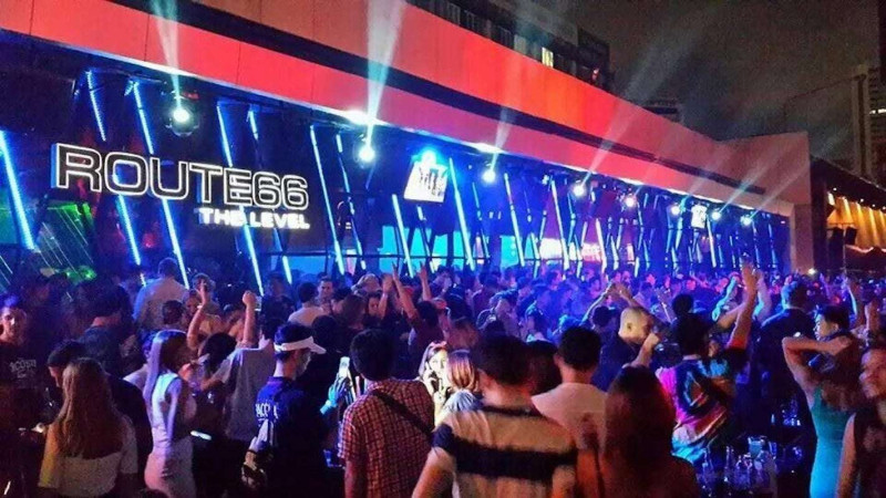 Thai couple together in temple or park setting